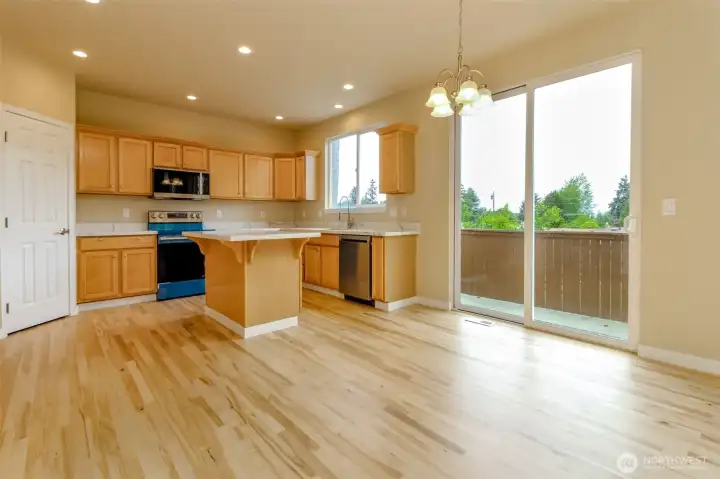 Kitchen & Sliding Patio Door to Backyard.