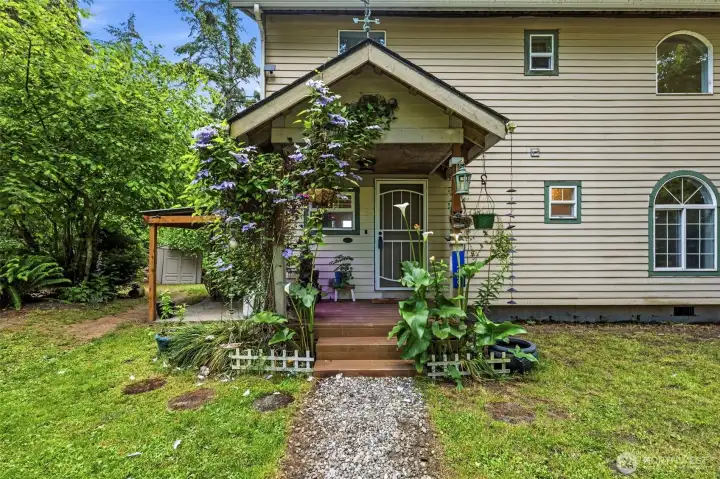 This full of life Porch is where you’ll start to fall in love with this property!