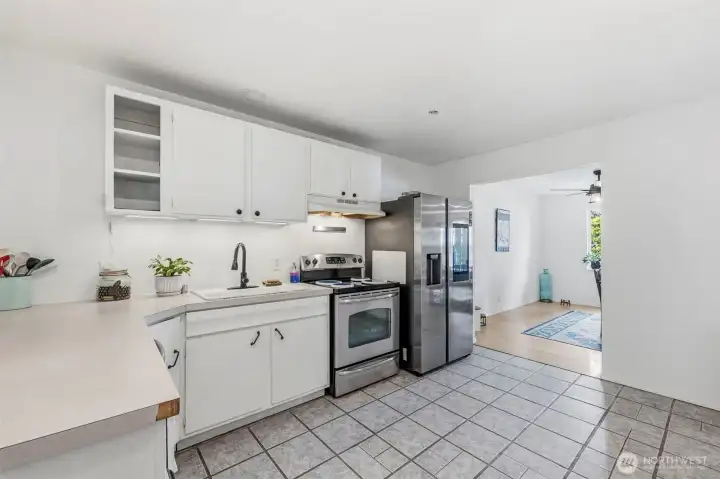 Updated kitchen beaming with natural light.