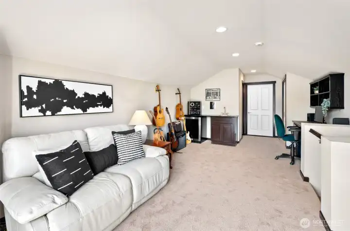 Bonus room over garage includes a half bath.