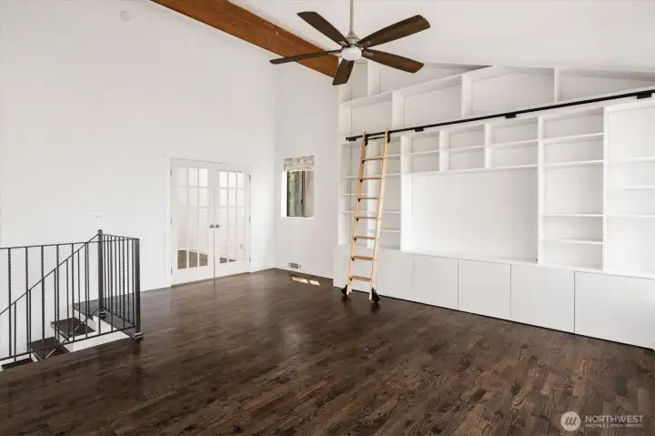 Additional view of upstairs family room with built-in bookcase Additional view of upstairs family room with built-in bookcase