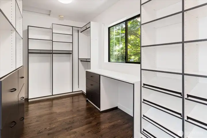 Massive upstairs primary walk-in closet with built-ins Massive upstairs primary walk-in closet with built-ins