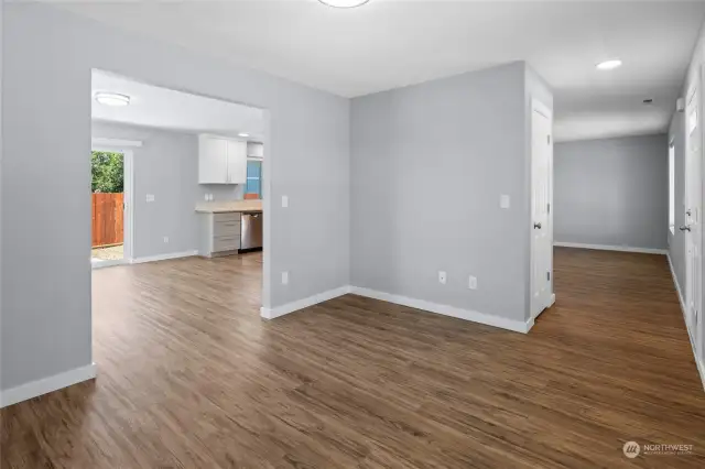 This living area leads into the dining area and kitchen space.