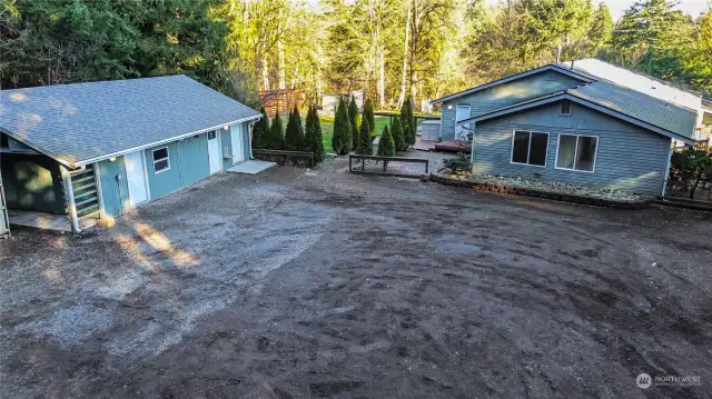 DRIVEWAY TO THE FRONT OF THE HOME. GARAGE TO THE LEFT