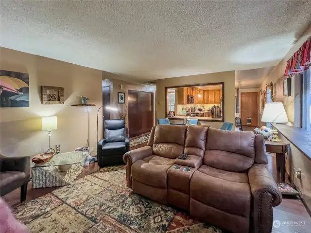 Living room is open to the kitchen.