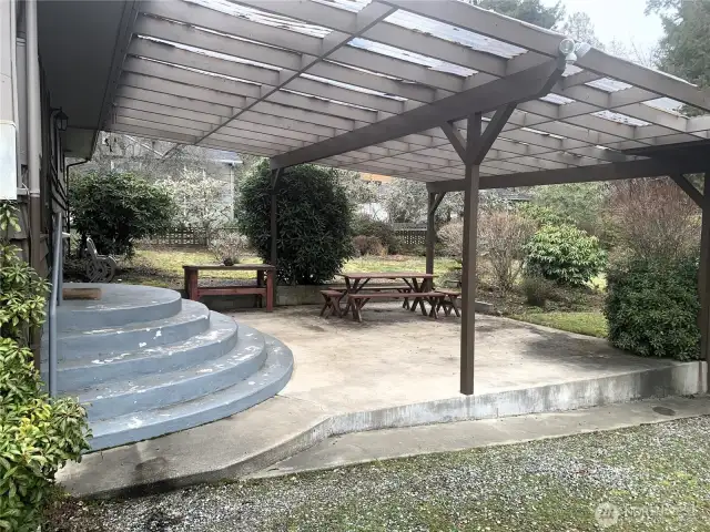 This large covered porch allows outdoor relaxation without getting wet.