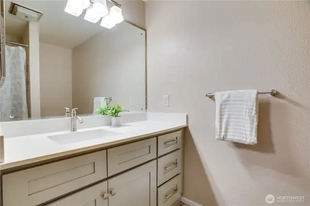 Refreshed and redone hall bathroom with full bathroom for the soaking experience, or daily shower.