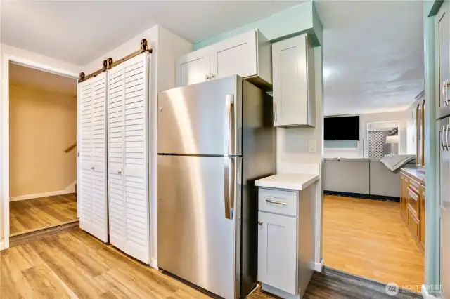 Behind the doors are the washer and dryer for maximum efficiency.  New appliances, including washer and dryer are available!