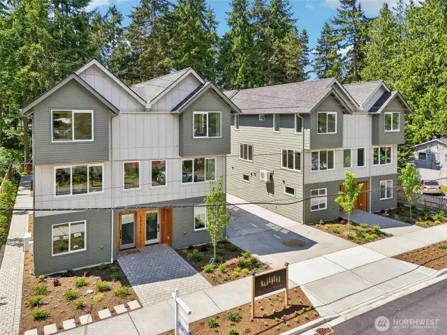 4 street side units are 2 bedroom, 2.5 bath, 1318 square with 2 car EV garages. 4 rear units are 4 bedroom, 2.5 bath, 1830 square feet with 2 car EV ready garages