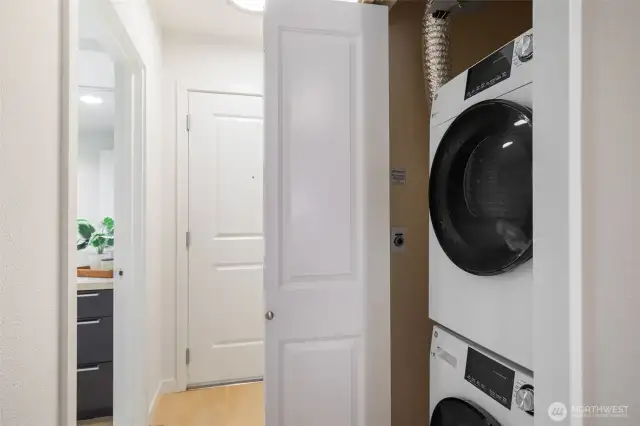 Convenient in-unit laundry. New stacked GE w/d included.