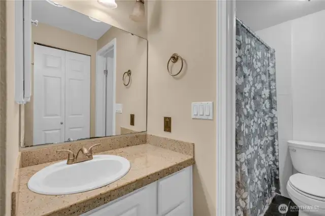 Primary bath with tub/shower combo.