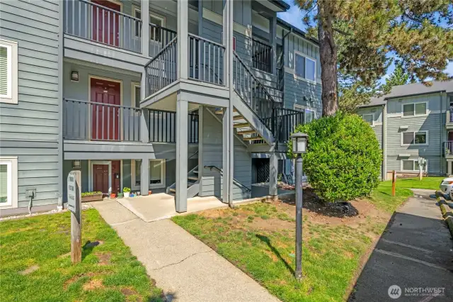 Entry to this unit. Stairs down, on the right.