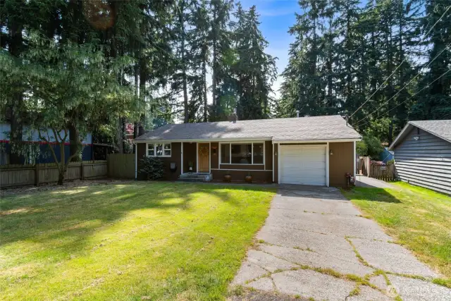 Spacious front yard offers great curb appeal and plenty of room to play, garden, or just enjoy the view.