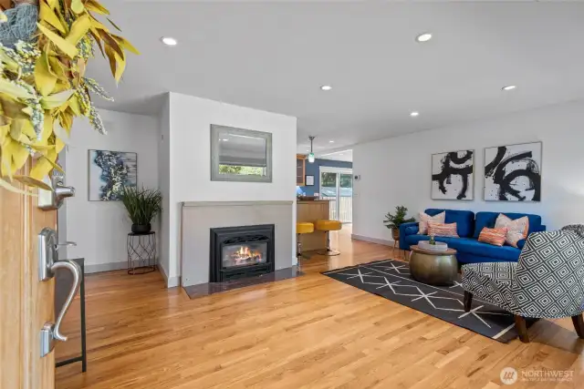 A charming gas fireplace creates the perfect focal point in the front room—ideal for relaxing evenings and adding warmth year-round.