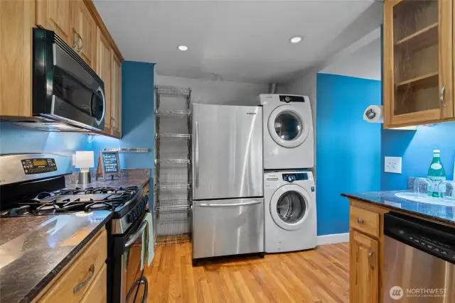 Convenient layout with washer, dryer, and refrigerator all within easy reach—ideal for multitasking and efficient use of space.