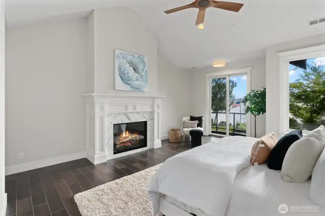 Breathtaking vistas surround the serene primary retreat, where elegant finishes create a perfect sanctuary.
