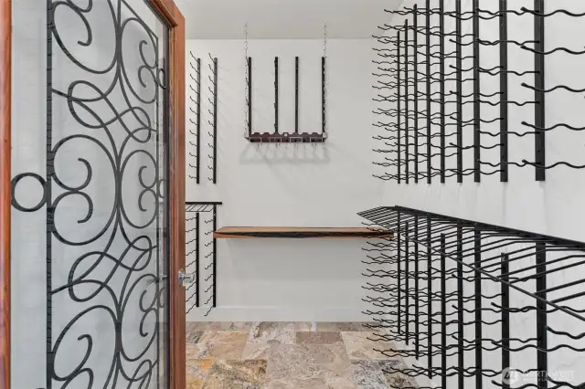 A temperature-controlled WhisperKool wine cellar holds hundreds of bottles - perfect for the serious collector.