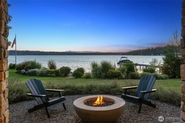 A built-in gas fire pit creates the perfect setting for cozy conversations on cool Northwest evenings.