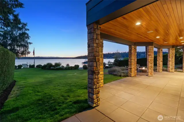 Timeless and gracious, the spacious lawn and covered patio evoke a Cape Cod charm rarely found along Lake Washington.
