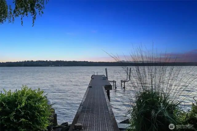 This waterfront home features a sleek, modern 94’ dock and 10,000 lb. lift - turnkey ready for your next lake adventure.