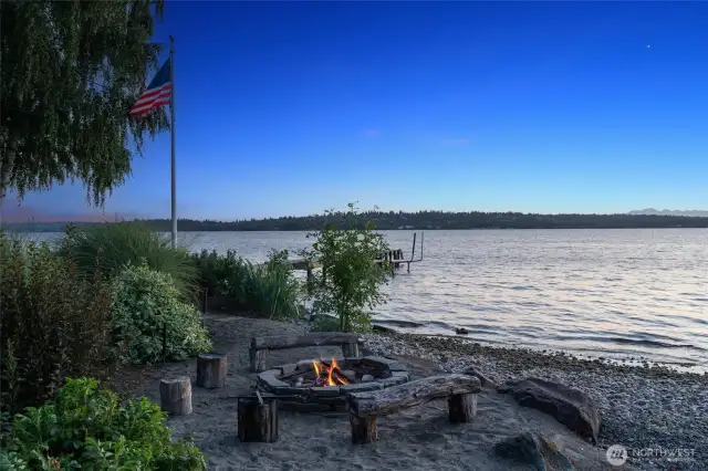 Where the lawn meets the lake, end the day with s’mores by the fire - pure waterfront magic.