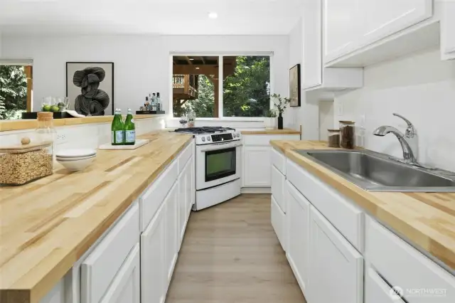 Brand new countertops, painted cabinetry.