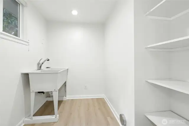 Used to be the utility room (W/D now in the huge garage). Add a fridge or put the W/D back in here.
