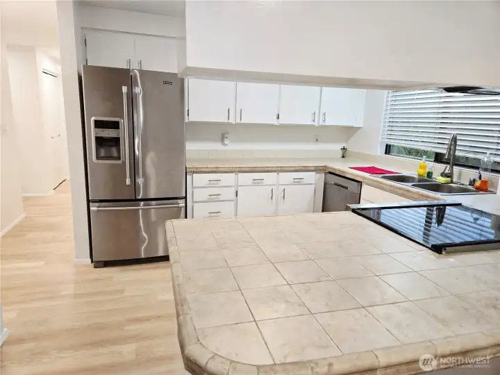 Stainless appliances stay with the home.