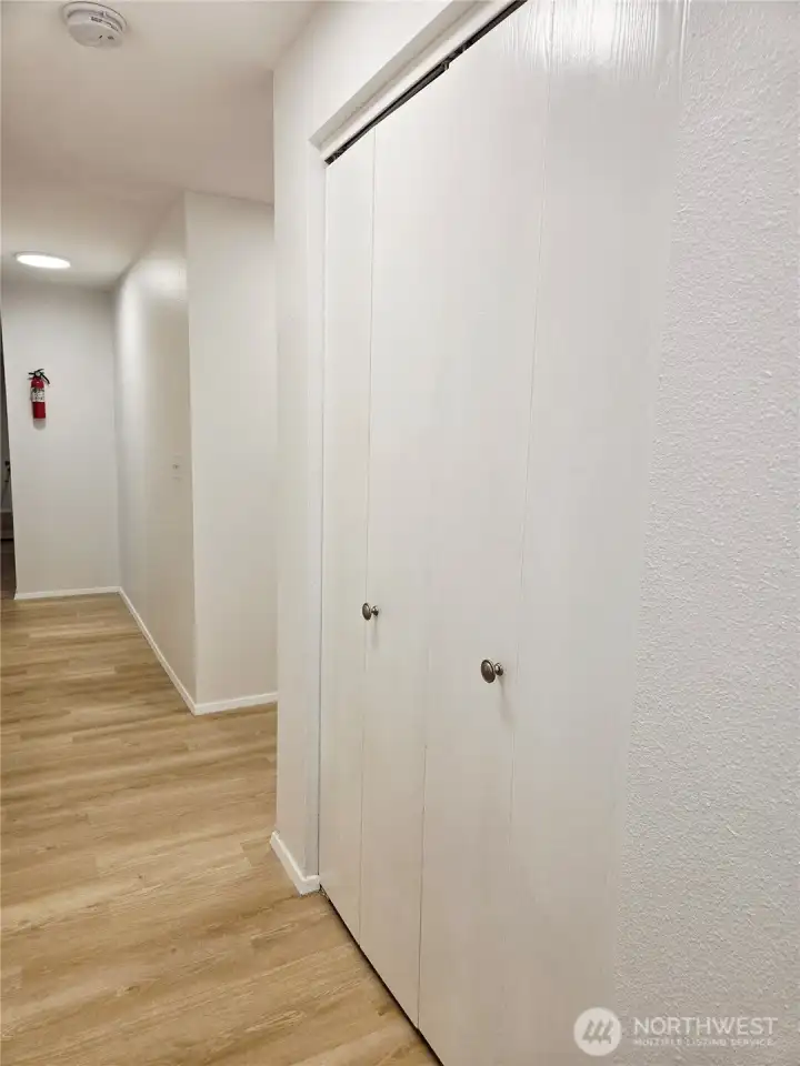 1 of 2 large hall storage closets