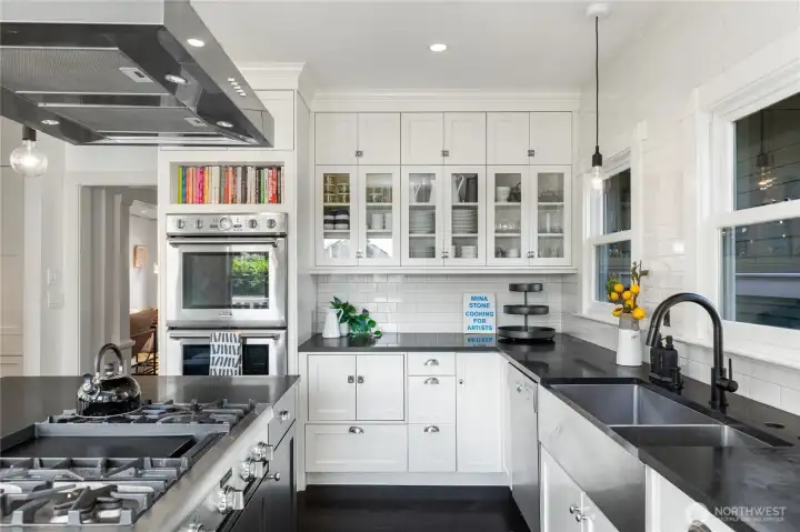 Ample prep space and custom cabinets that map to original craftsman design