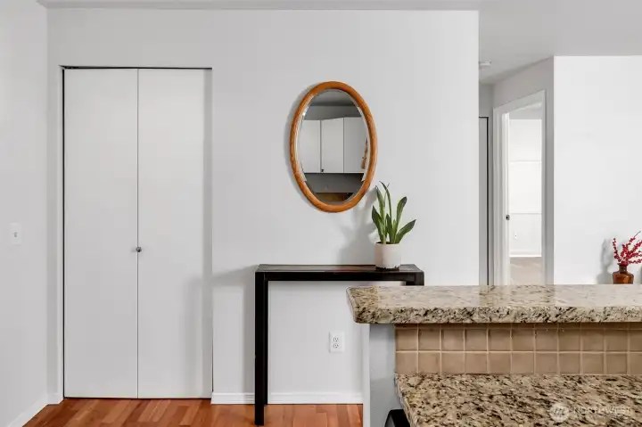 The entry area with roomy coat closet