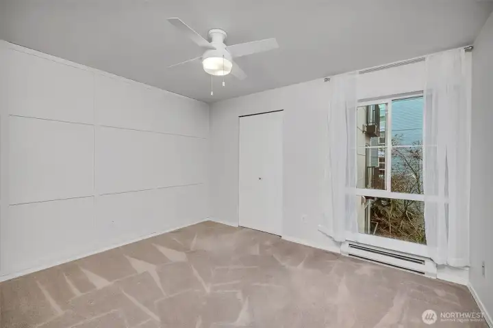 Large bedroom, big enough for a king size bed, dresser/s and more