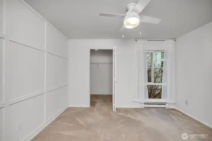 So much room, privacy from the tree outside the window and a large walk-in closet. Ceiling fan will provide a nice breeze in the Summer