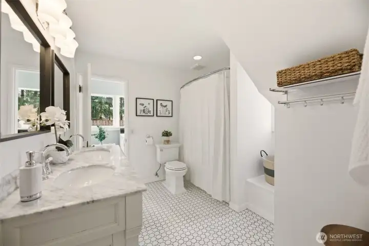 A bright, airy bath on the first floor that feels both timeless and refreshed.