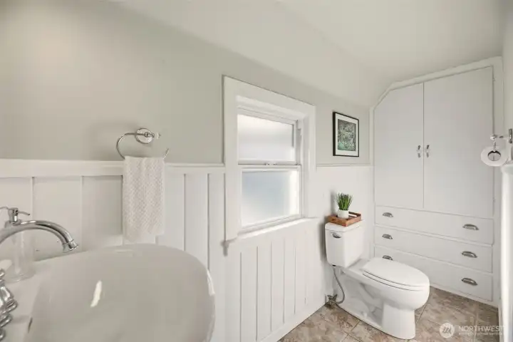 Upstairs bathroom with built in storage.