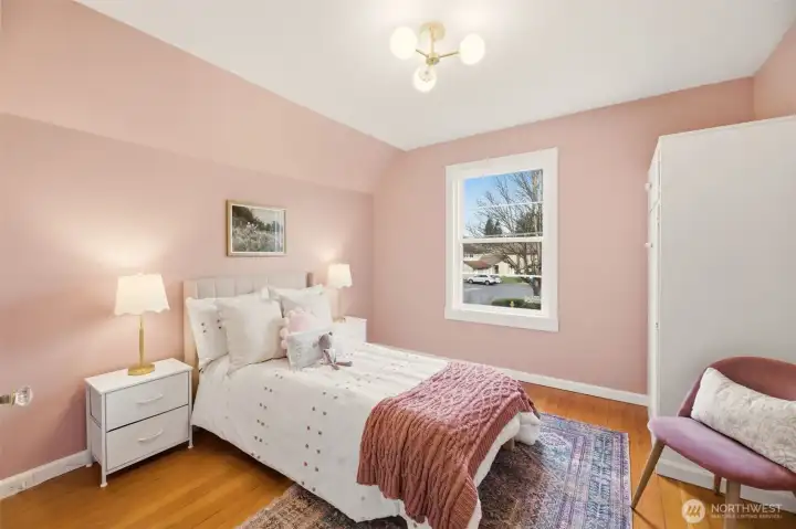 Peaceful bedrooms with large windows and abundant natural light.