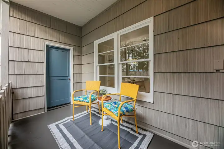 Cozy back porch perfect for relaxing.