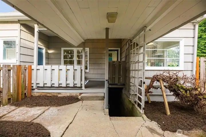 Covered walkway to spacious parking.
