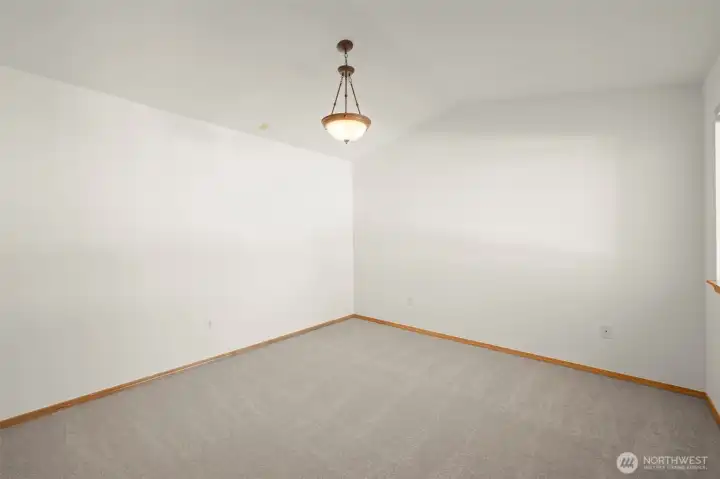 Primary Bedroom with vaulted ceiling