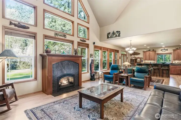 Wall of Windows with a Cozy Gas Fireplace