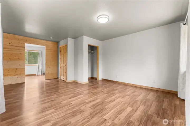Primary Bedroom with a wall added with intent of putting in a bathroom upstairs, or small sitting area