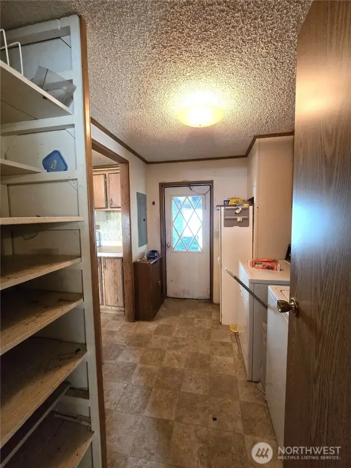 Utility Room with door to enclosed porch
