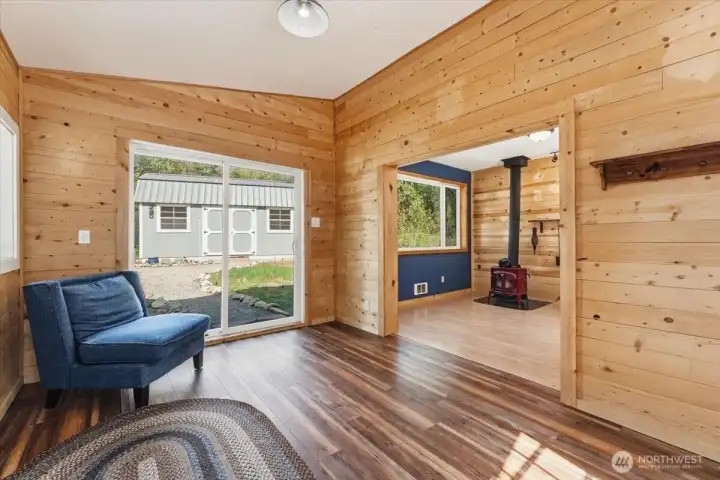 Sliders off the other end of the living room. Kitchen/dining area straight ahead.