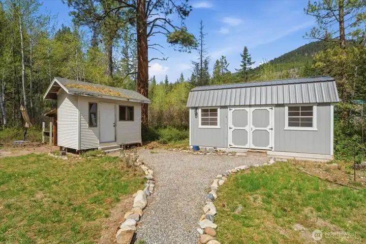 Storage shed and separate bunkhouse.
