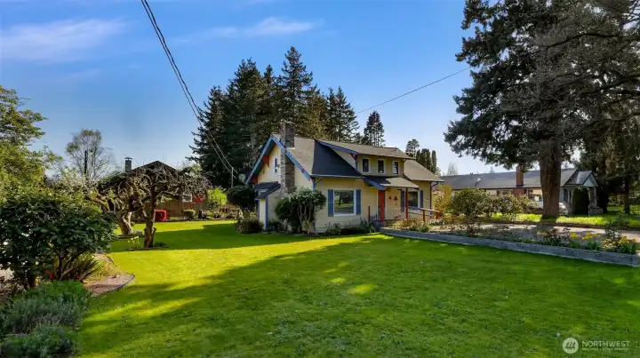 Your Birchwood 3 bed 1.75 bath Craftsman Mini-Farm in an excellent location with a separate woodshop, root cellar, garage and stone storage building.  Gardens, fruit trees, and a place for feathered or furry friends.