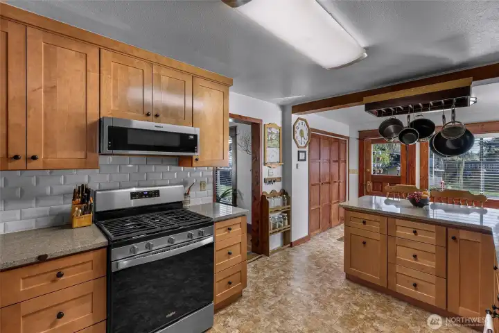 Remodeled kitchen boasts custom cabinets, countertops and sink