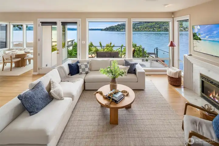 Designed for both gathering and retreat, the recently updated entertainment spaces flow together effortlessly, opening to the deck and sparkling lake. Designed for both gathering and retreat, the recently updated entertainment spaces flow together effortlessly, opening to the deck and sparkling lake.
