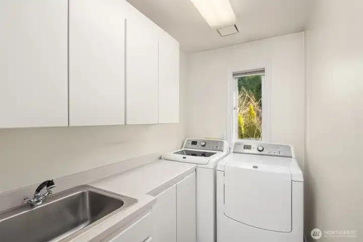 Laundry room located on the upper level.