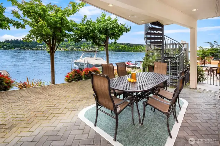 A covered patio space for perfect for al fresco dining. A covered patio space for perfect for al fresco dining.