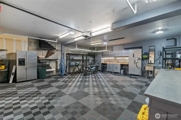 Finished Improved Garage, Living Space, Custom Staircase w/ Direct Garage Access